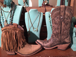 Vegas Cowboy Boots (the ones on the left just came in, the other ones on the right will be here soon) Great ankle boot to complete the, "You got it girl" look!  Available in sizes 6.5 - 9.5   Come and get em'